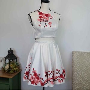 white two piece dress with red and pink flowers
